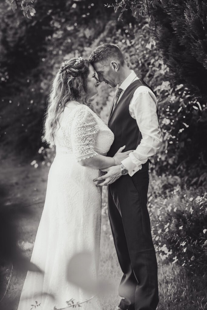 Black and white image of bride and groom