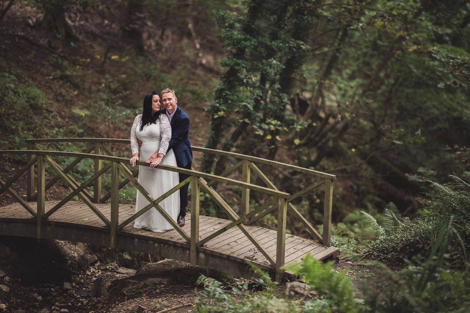 Bride and Groom on a bridge